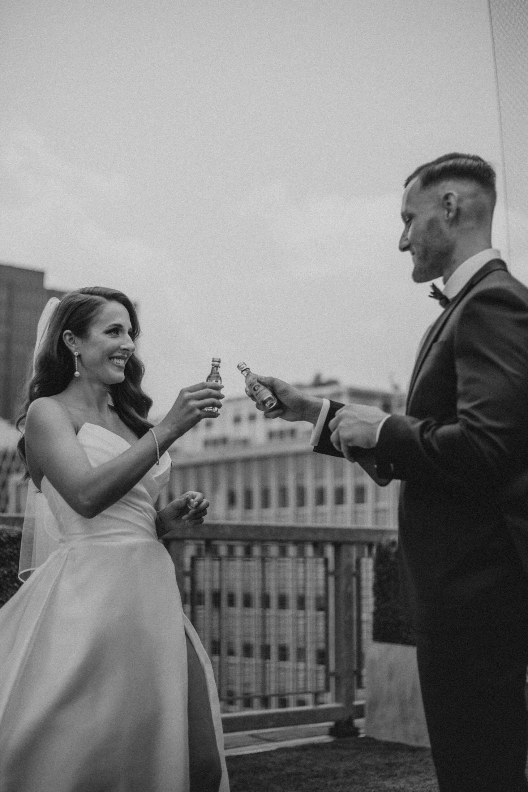 newlyweds cheer as they finish their complete wedding guide